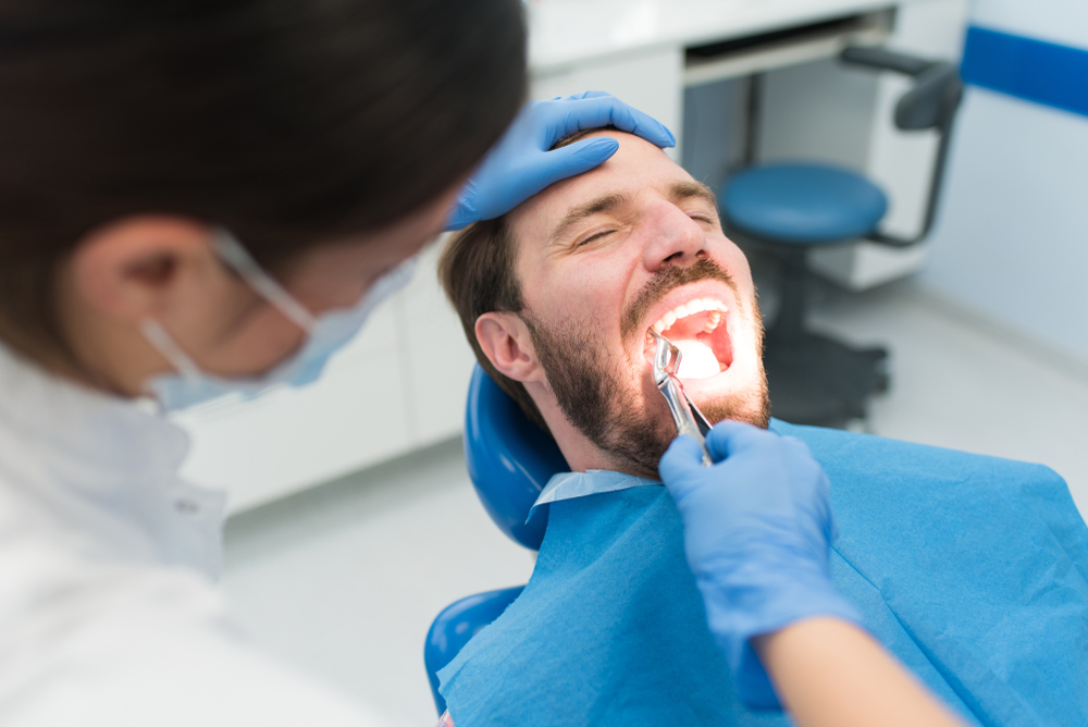 extraction vs monitoring whats the best choice for wisdom teeth