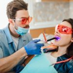 girl teeth cleaning in dental clinic