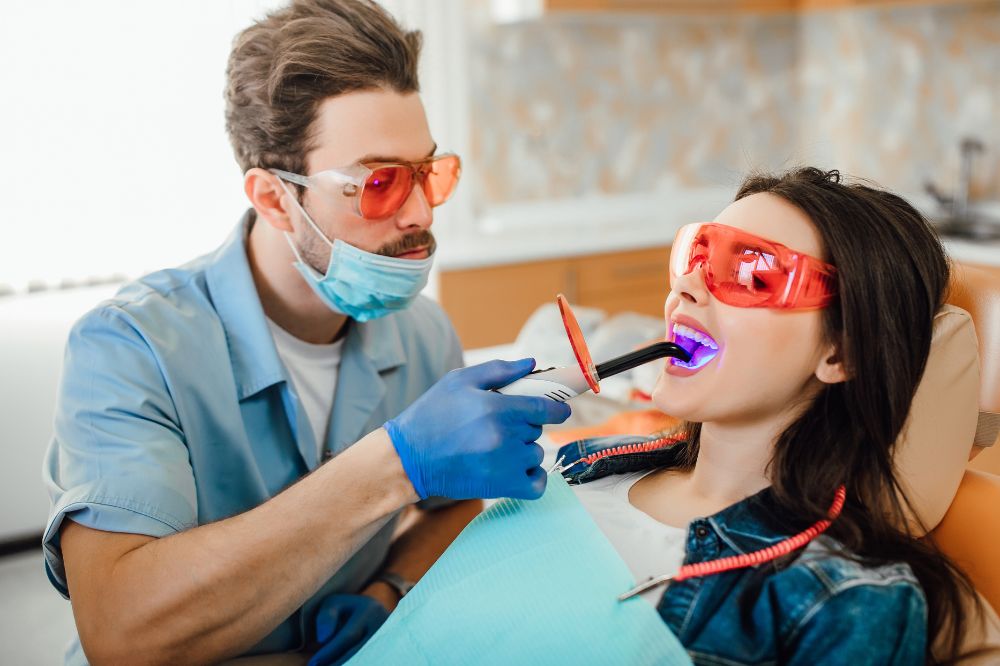 girl teeth cleaning in dental clinic